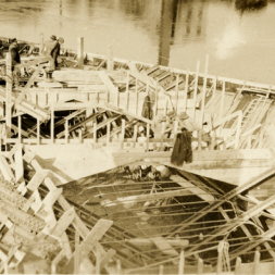 Workers building the bridge falsework