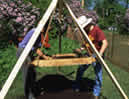 Photo of archaeoalogists in the field screening soil