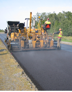 Pavement truck rolling on pavement