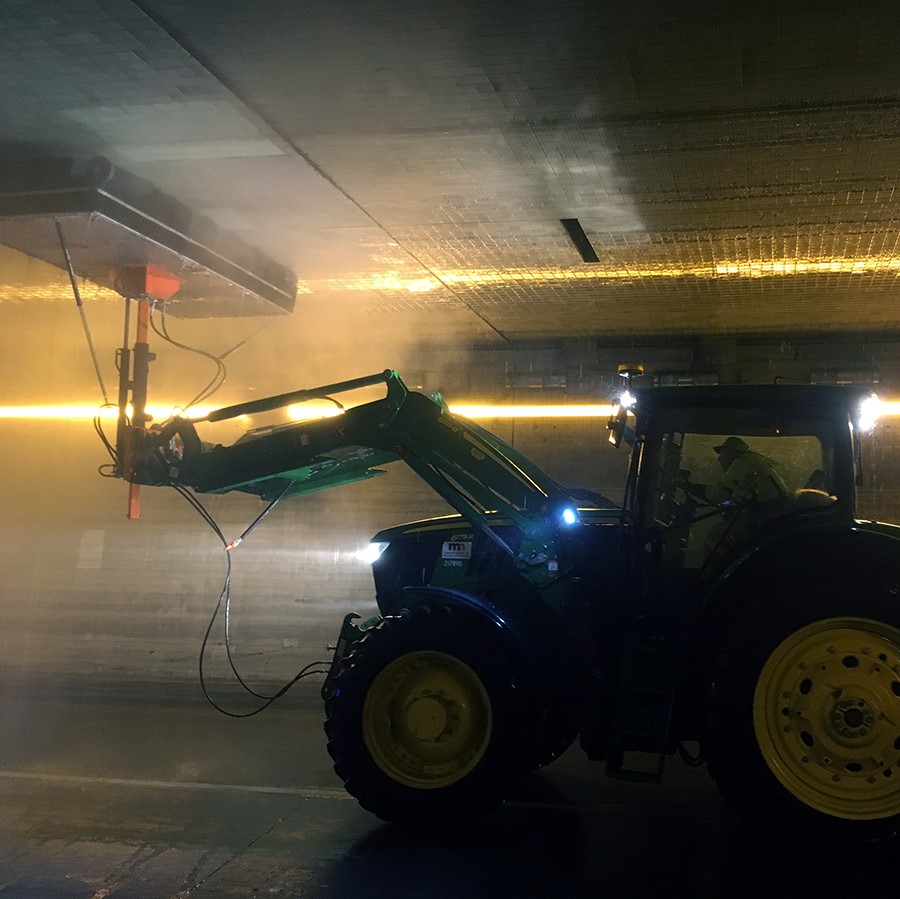 photo of tunnel washer in action