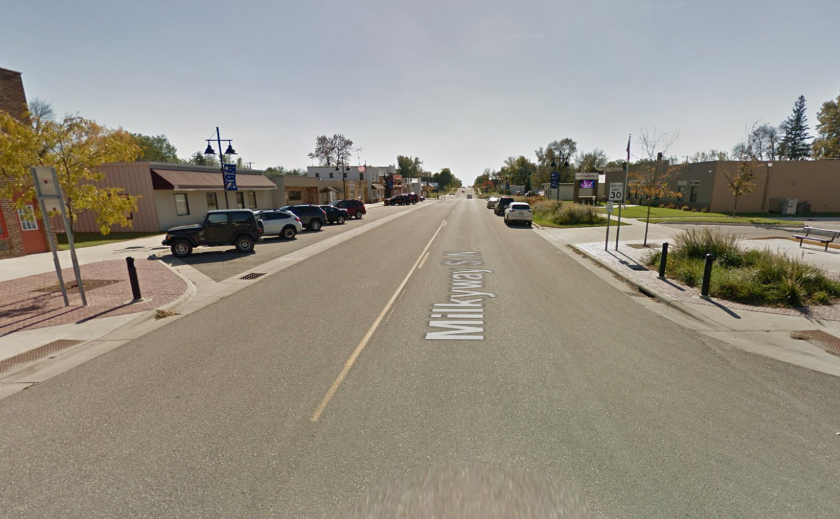 Highway 4 in Cosmos, MN after construction, showing curb extensions, lane adjustment, angle parking, and landscaping