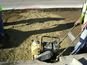 Preparing base for new concrete